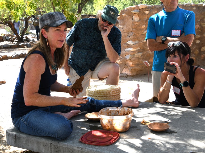 Cherylene Caver demonstrating coiled pottery